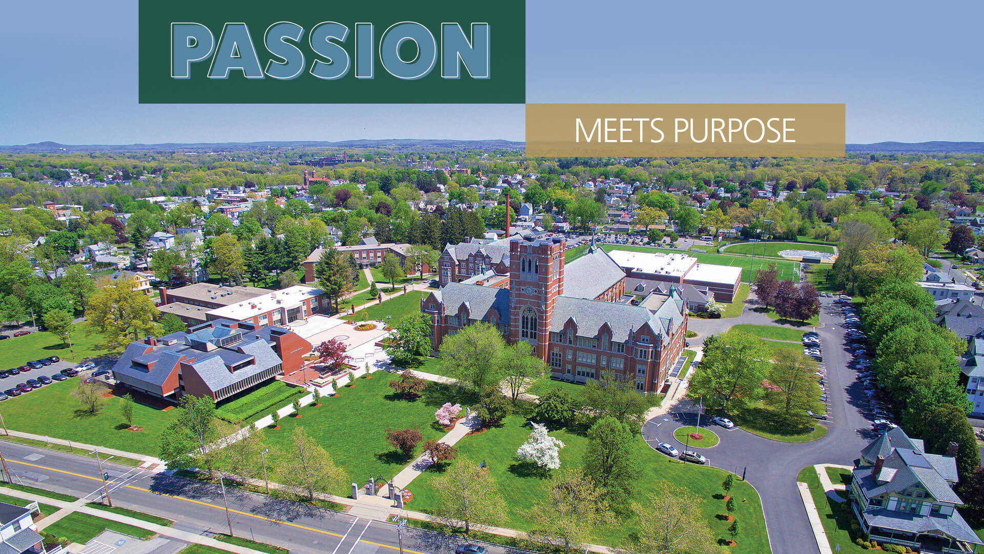 Aerial photo of Elms College with text that reads 'Passion Meets Purpose'